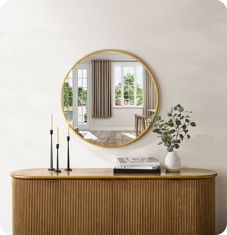 Elegant wooden console with a round mirror and minimalist decor.